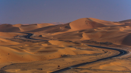 Fototapeta na wymiar highway desert road on sand dunes