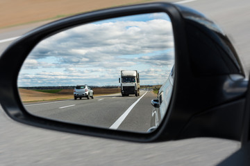 view of the outside car rearview mirror