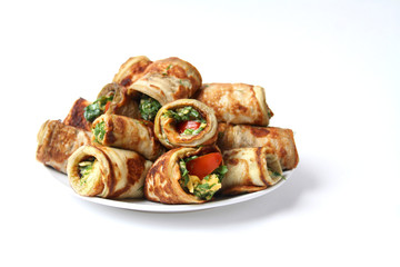 Traditional Ramadan Food. Eggplant Rolls With Filling From Cheese, Herbs And Tomatoes On Plate Isolated On White Background. Side View.