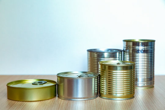a tin can,an iron can, is on the table
