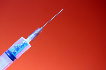 Syringe with a chip. The concept of the theory of conspiracy and implantation of vaccinated chips....