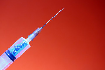 Syringe with a chip. The concept of the theory of conspiracy and implantation of vaccinated chips....