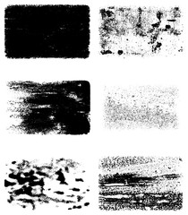 A set of vector grunge textures. Black and white patterns of scratches, cracks, chips, and dust. Abstract ink spots