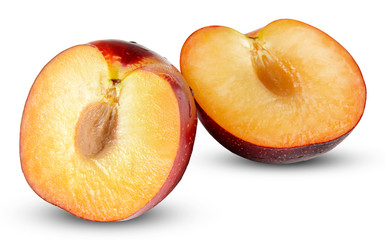 Two halves of plum on a white isolated background. Clipping path.