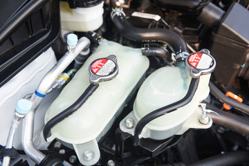 coolant car engine detail - close up of machine new engine motor checking and cleaning for deliver...