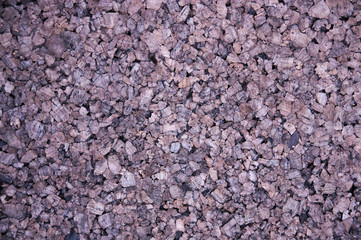 A closeup of a natural cork chipboard