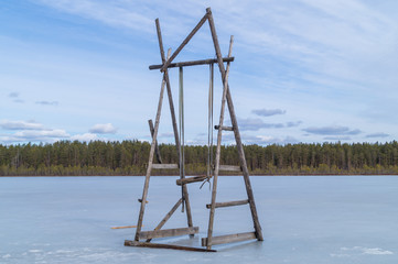 Swing stand on a frozen lake. solitude concept. nature landscape