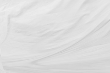 White cloth background abstract with soft waves.