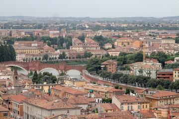 Obraz premium Above View Of Verona Town With Adige River, Italy as seem from the Lamberti tower height, Torre dei Lamberti