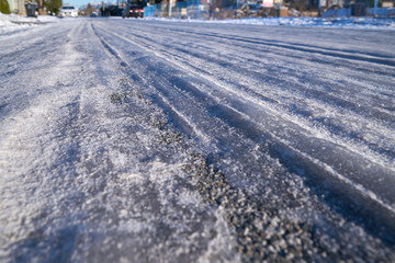 Frozen Slick Road. A hazardous icy, slippery road.

