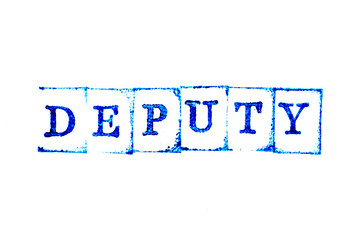 Blue ink of rubber stamp in word deputy on white paper background