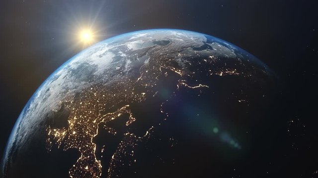 Rotating planet Earth with a real tilt axis and direction of rotation. Sunrise over the eastern hemisphere. Elements of this video furnished by NASA