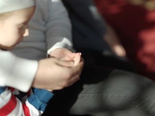 father and son in mosque praying and reading holly book quran together