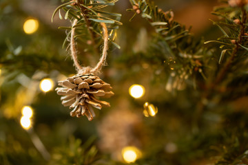 Zero waste christmas concept. Christmas tree decorated with decorations from natural materials and...