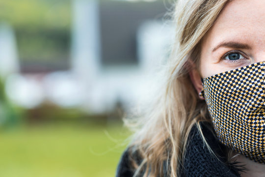 Woman Outside With Wool Mask On Her Face