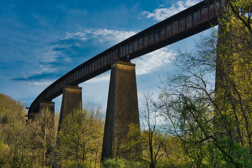 A railway bridge with blue sky baclground.