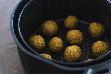 plant-based food, vegan chickpea falafels in air fryer basket