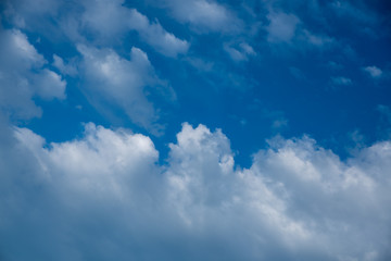 Fototapeta premium Blue sky with white and gray clouds
