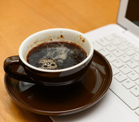 laptop and cup of coffee