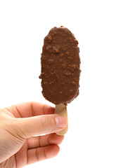 hand holding a fresh chocolate and coffee flavor popsicle on white background