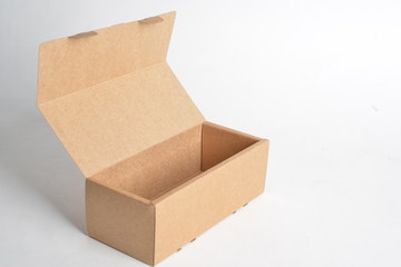 close-up single carton box open empty isolated on white background, brown parcel cardboard box for packages delivery