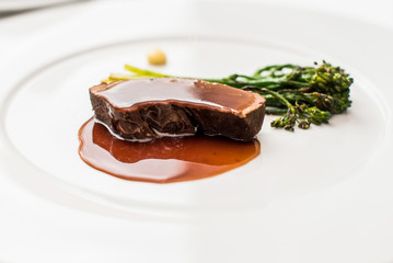 Typical Austrian meat dish with sauce and vegetables