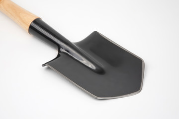 small shovel for tourism and earthworks on a white background