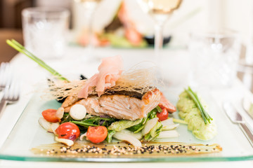 Asian dish with shrimp, salmon and sauce