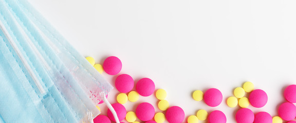 Medical mask surgical protective virus, flu, disease and pills. Isolated on a white background.