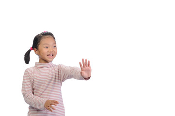 Social distance concept. A little asian kids showing raise her hand to prohibit others from getting close within 2 meters from keep distance protect from COVID-19 and The risk of infection to others.