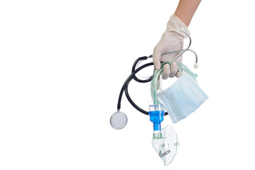 Protection Coronavirus and Air pollution pm2.5 concept. Close up hand of doctor holding a self-protect mask, stethoscope, respiratory mask for preventing air pollution and viruses on isolate of white.