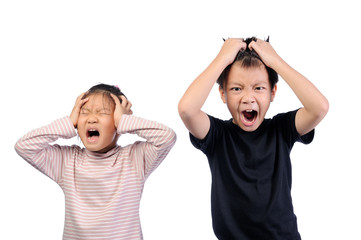 Cumulative stress condition concept. Facial expressions and emotional gestures of children in high stress conditions. Two asian kids boy and girl raise hands holding to head and angry of emotion face
