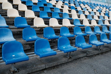 stadium summer autumn chairs of different colors white and blue