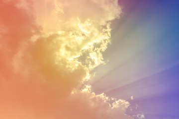 Obraz na płótnie Canvas rainbow light with orange clouds