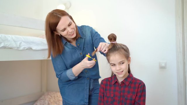 Mom Cuts Hair At Home Child During Quarantine.