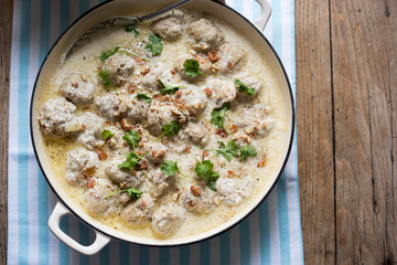 Pork meatballs with almonds in mustard cream sauce 