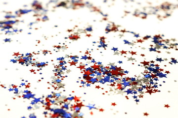 4th of July American Independence Day decorations stars confetti pattern isolated  on white background. top view, flat lay 