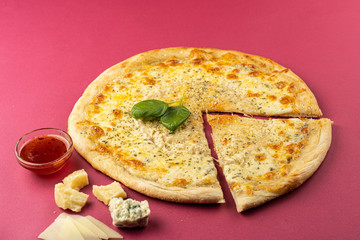 pizza close-up, isolated, against a colored background. whole pizza 