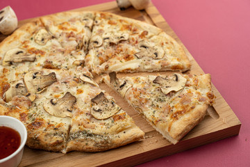 pizza close-up, isolated, against a colored background. whole pizza 
