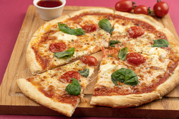 pizza close-up, isolated, against a colored background. whole pizza 