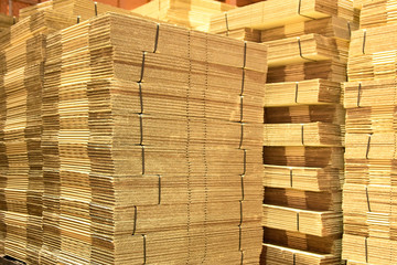 stack of cardboard boxes in stock at factory warehouse, packaging, carton box