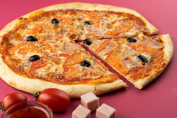 pizza close-up, isolated, against a colored background. whole pizza 