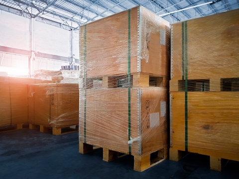 Stacked of Wooden Crates in Storage Warehouse. Supply Chain. Storehouse Commerce Cargo Shipment. Warehouse Shipping Logistics.