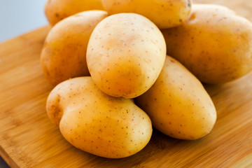 close up potatoes on kitchen table
