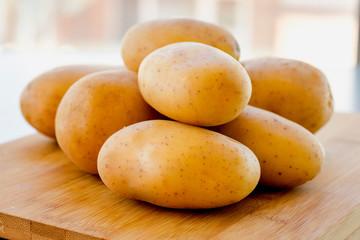 close up potatoes on kitchen table