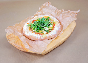 Italian homemade pizza with mozzarella and tomatoes