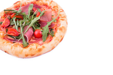 Pizza with ham, tomatoes, arugula and mushrooms on a white background.