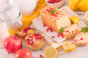 Lemon sponge cake with pomegranate.
