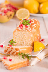 Lemon sponge cake with pomegranate.
