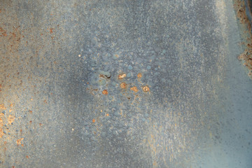 metal piece with rust on it